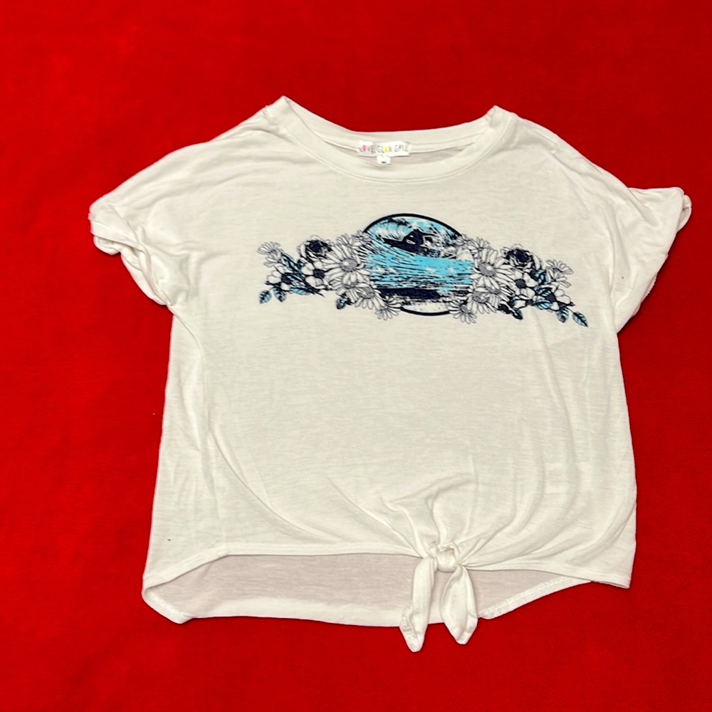 A White short sleeve with blue flowers and a surfer (girls)